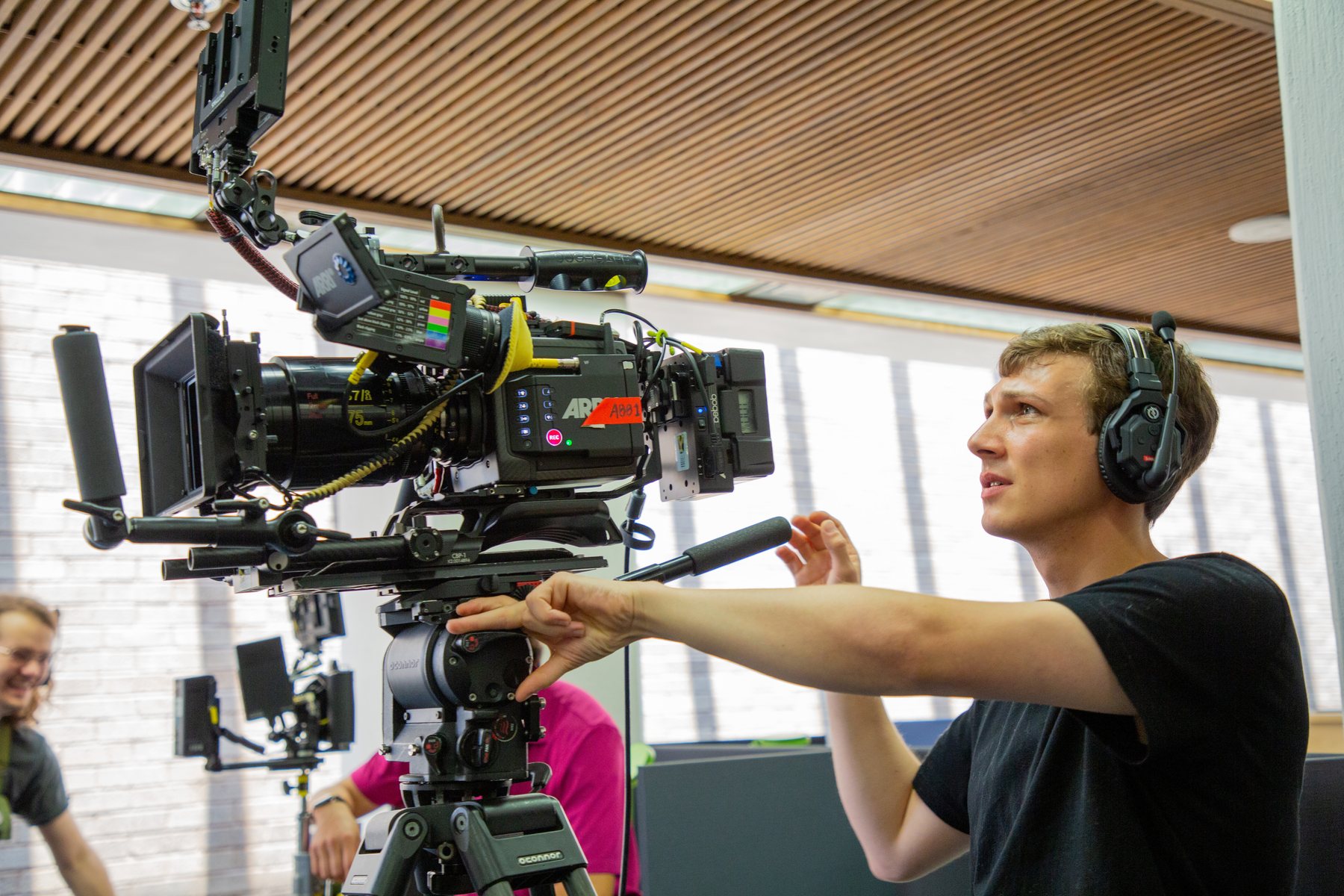 Eric works at a fully built cinema camera rig.